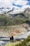 Hikers standing at the edge of the Aletsch Glacier