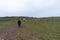 Hikers start on the trail up to the cliffs of Latrabjarg to view birds and practice