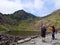 Hikers stopped to take picture of mount Snowdon