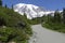 Hikers on trail above Paradise with  Mount Rainier