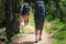 hikers on the trail in the Islandic mountains. Trek in National Park Landmannalaugar, Iceland. valley is covered with bright green