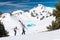 Hikers Trek Through a Winter Mountain Landscape