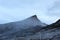 Hikers trekking towards the misty Lowâ€™s Peak, Mount Kinabalu before sunrise