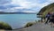 Hikers wait at boat launch on Patagonia glacier lake