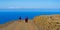 Hikers walked along a wide path on the Island of El Hierro.