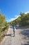 Hikers are walking on the pathway to the national park of the calanques of Marseille, Provence region. There are very beaut