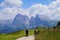 Hikers walking towards the Langkofel