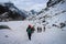 Hikers walks on footpath in Himalayas