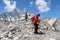 Hikers walks on glacier in Himalayas