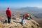 Hikers watch the terrain