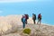 Hikers watch the terrain