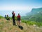 Hikers watch the terrain