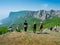 Hikers watch the terrain