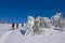 Hikers in a winter plain