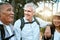 Hiking, adventure and exploring with a group of senior friends and retired adults enjoying a hike or walk outdoors in
