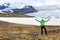 Hiking adventure travel man cheering happy Iceland