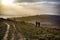 Hiking in the beautiful sunset with hills in the background