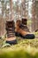 Hiking boot in forest. Waterproof leather shoes