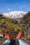 Hiking boots against fjords in Norway