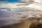 Hiking couple happy to reach on top of a mountain