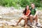 Hiking couple - hikers resting in Zion Park