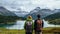 Hiking Couple\\\'s Alps Lake Panoramic View. Alpine Adventure With Love. Generative AI