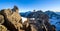 Hiking couple stands on the summit and looks towards Austria's highest mountain, Grossglockner, Tyrol, Austria, Europe