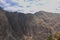 Hiking down the stark mountainside of the Patacancha Mountains in Urubamba Province in Peru