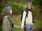 Hiking hand in hand. a young couple hiking hand in hand in the great outdoors.