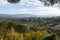 Hiking on hills of Val d`Orcia near Bagno Vignoni and view on Rocco d`Orcia, Tuscany, Italy. Tuscan landscape with cypress trees