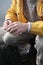 Hiking history, travel. Young man hiking in Russia, Karelia. Atmospheric moment.  Hipster traveler in yellow raincoat drinking fro