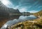 Hiking impressions along the trail from Kvalvika beach to top of mount Ryten in Lofoten Islands Norway on a blue ans