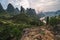 Hiking in the Karst mountains in Guilin region of South China, close to Xingping village, Li River
