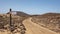 Hiking marker sign in Los Lobos Islet, Fuerteventura, Canary Islands, Spain