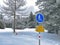 Hiking markings and orientation signs with signposts for navigating in the idyllic winter ambience above the tourist resort