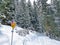 Hiking markings and orientation signs with signposts for navigating in the idyllic winter ambience above the tourist resort