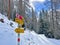 Hiking markings and orientation signs with signposts for navigating in the idyllic winter ambience above the tourist resort