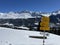 Hiking markings and orientation signs with signposts for navigating in the idyllic winter ambience of the Swiss Alps