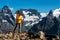 Hiking in the mountains. A person is engaged in Nordic walking in the Caucasus mountains. Copy space