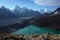 Hiking in Nepal Himalayas, Clouds are reflecting in Gokyo lake, with view of Gokyo village