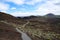 Hiking path along a chain of volcanic cinder and spatter cones