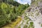 Hiking path in alpine rocky canyon