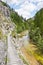 Hiking path in alpine rocky canyon