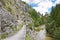 Hiking path in alpine rocky canyon