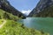 Hiking path around mountain lake. Alps mountains, Stillup Lake, Austria, Tyrol Region