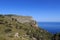 Hiking path in Majorca Tramuntana with Mediterranean Sea in background