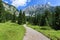 Hiking path through summer mountain landscape. Wild Kaiser cain or Wilder Kaiser, Austria, Tyrol