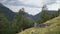 Hiking through the raw nature with mountains, cliffs and forests that surrounds Geiranger village and fjord, Norway