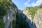 Hiking in Saillon, Valais, Switzerland on the Farinet Bridge over the gorges Salentze