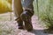 Hiking shoes woman in beautiful rock trail,Hiker trekking or walking at nature,Close up